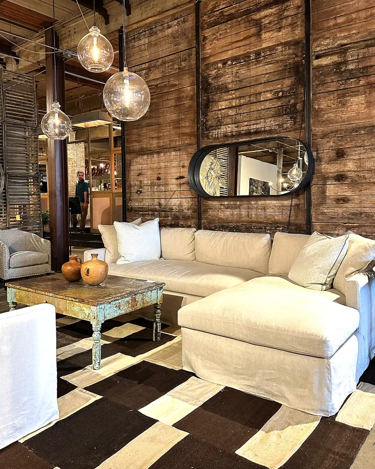 White sofa sectional in the Cisco Home showroom in High Point, NC