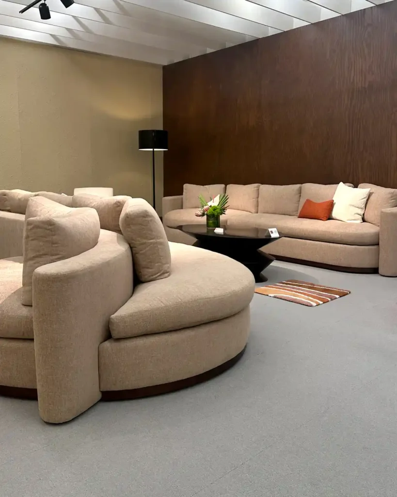 A look at the Thayer Coggin showroom at High Point Market spring 2025 featuring the Playing Hooky sofa sectional