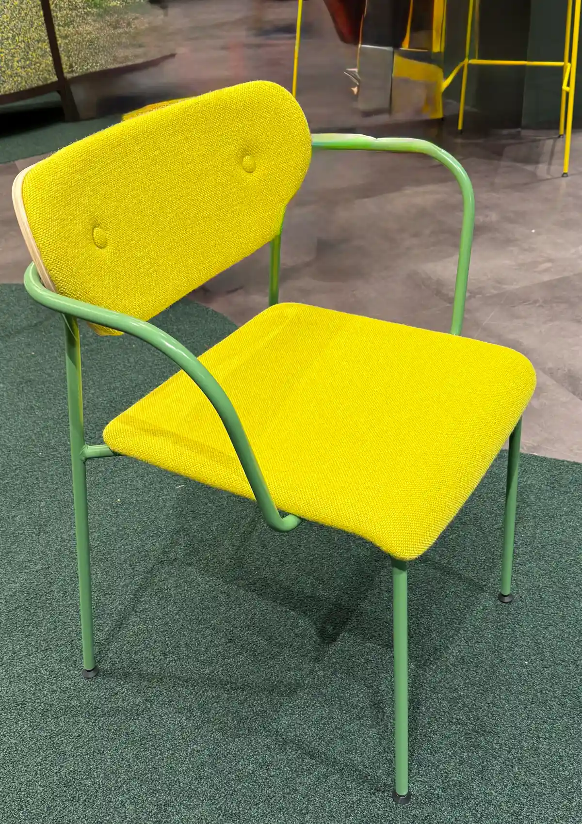 bold color upholstery fabric on mid-century modern chair with soft curves