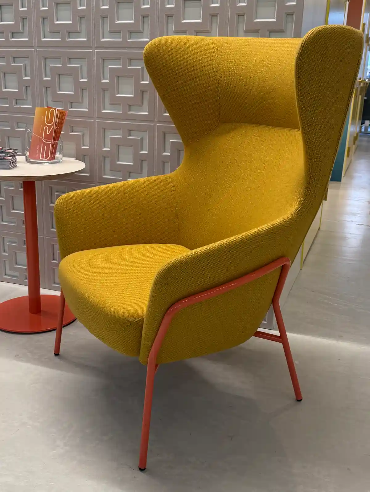 Curvy furniture with mid-century modern design style in unexpected colors like gold and red