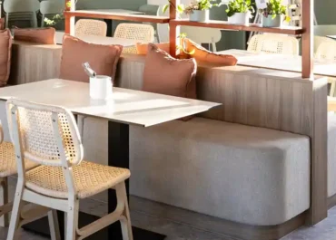 Find contract fabric for a commercial environment like this banquette seating that repels liquid