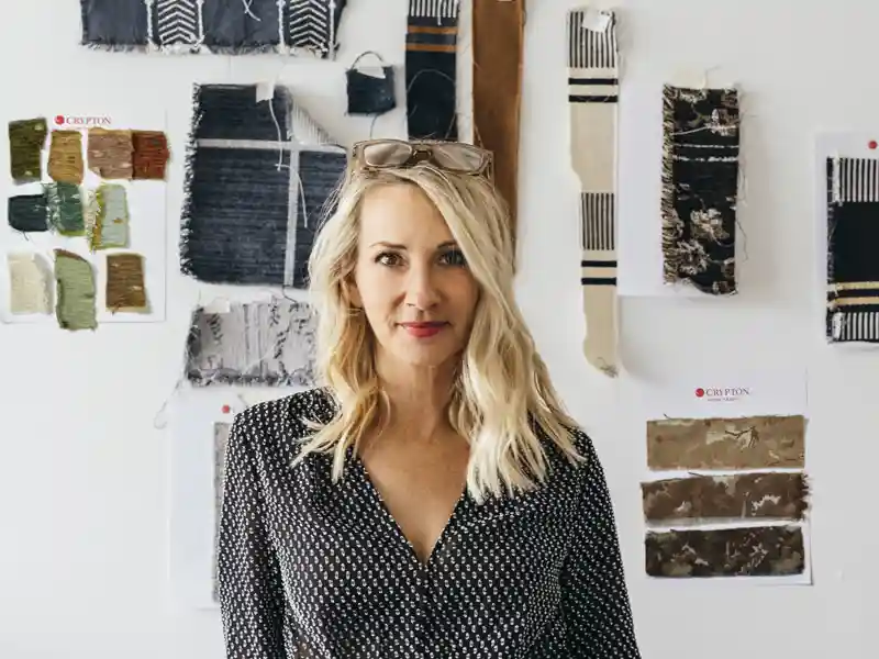 Kim Salmela shown with her new upholstery fabric collection with Crypton