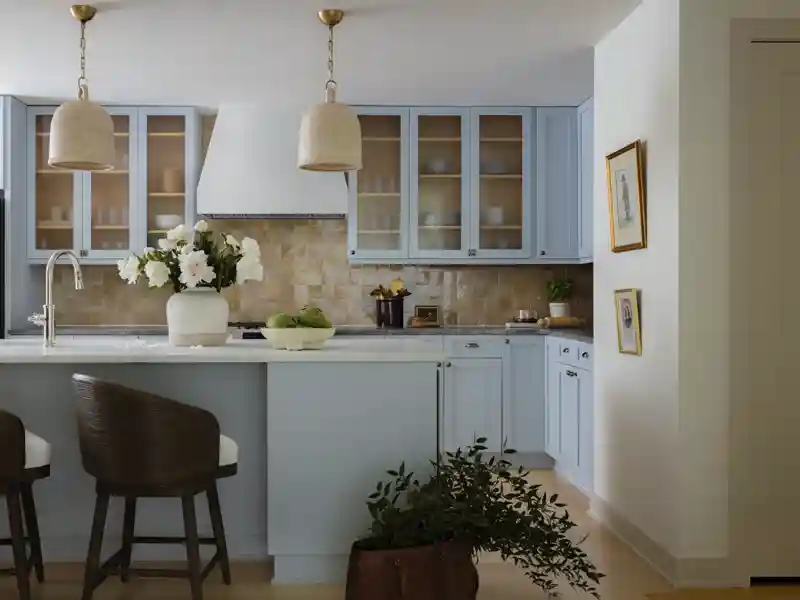 light blue kitchen design with performance fabric upholstered stools