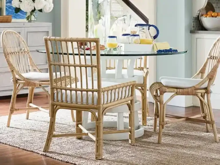 Rattan dining chairs with a coastal beach vibe