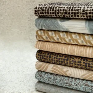 Stack of performance fabrics Montage Weaves Collection Kravet Contract
