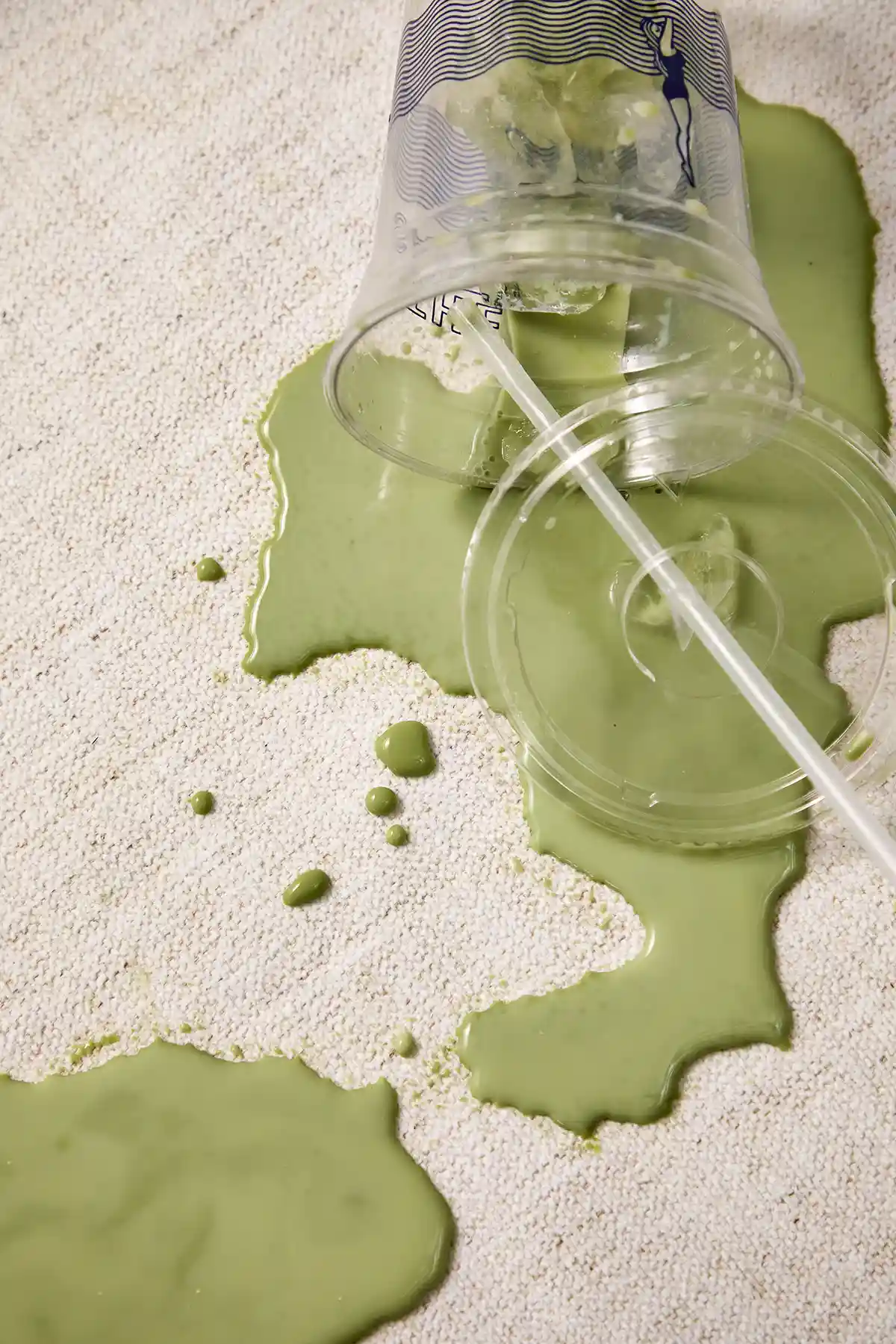 green liquid spill on white couch easy to clean performance fabric