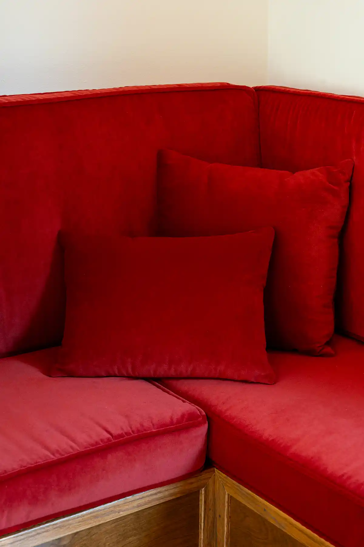 Crypton Sintra in Poppy, a red performance velvet was chosen for the banquette seating
