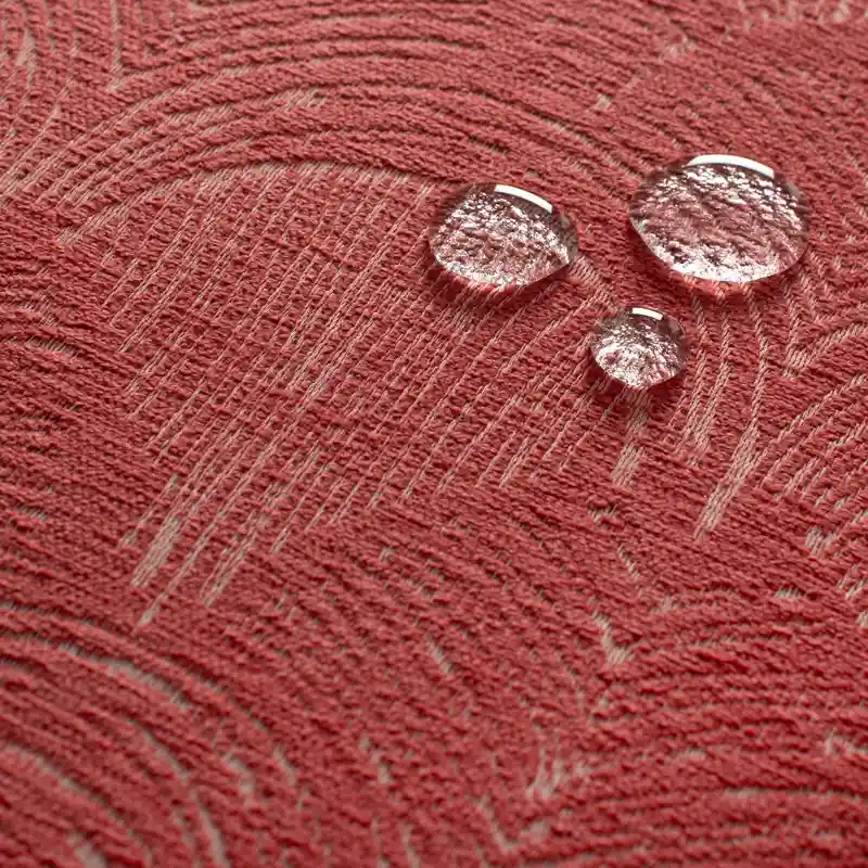 close up showing how performance fabric works by repelling water