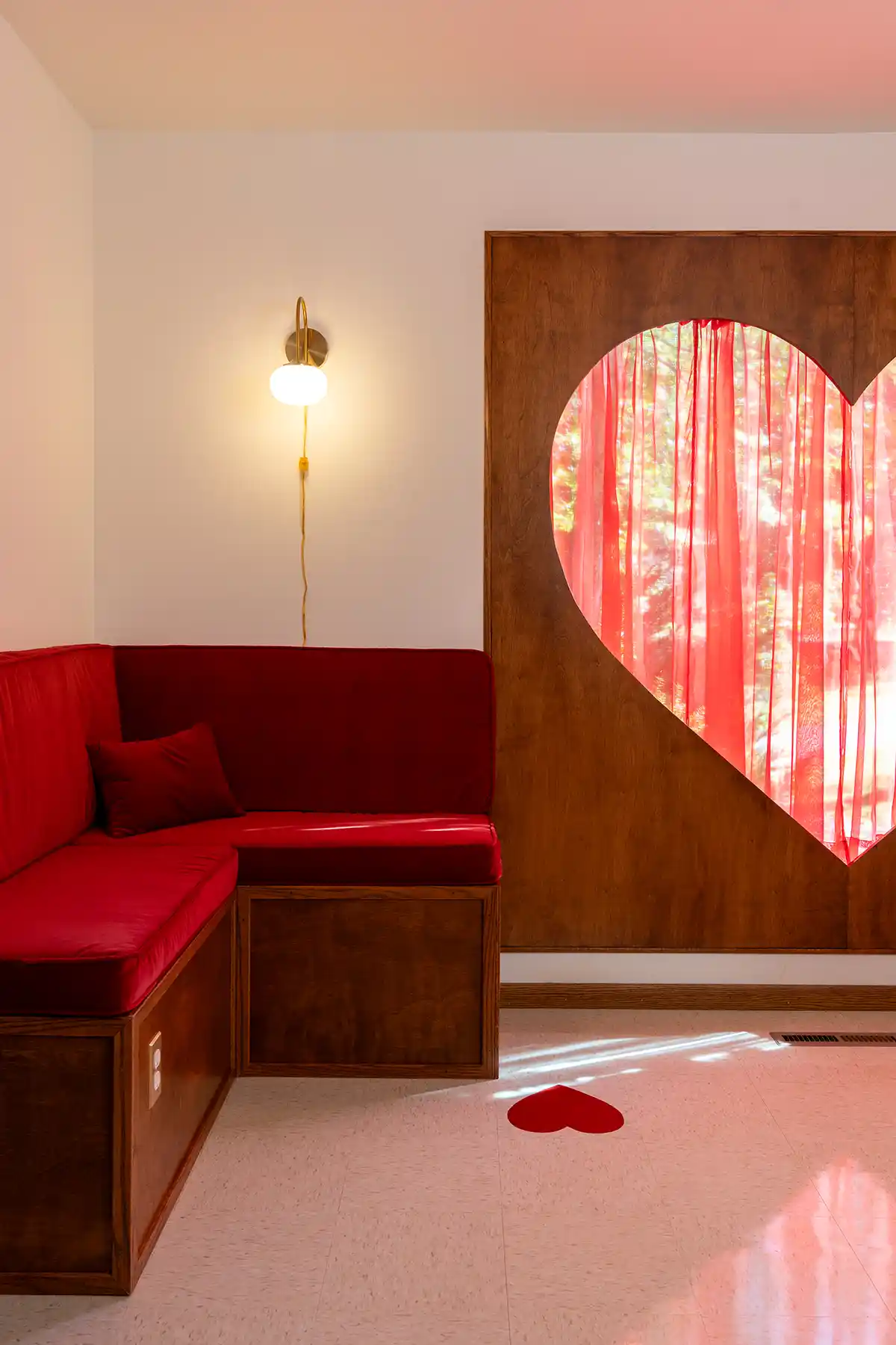 Heart shaped window in kitchen dining area at the Sweetheart Hideaway