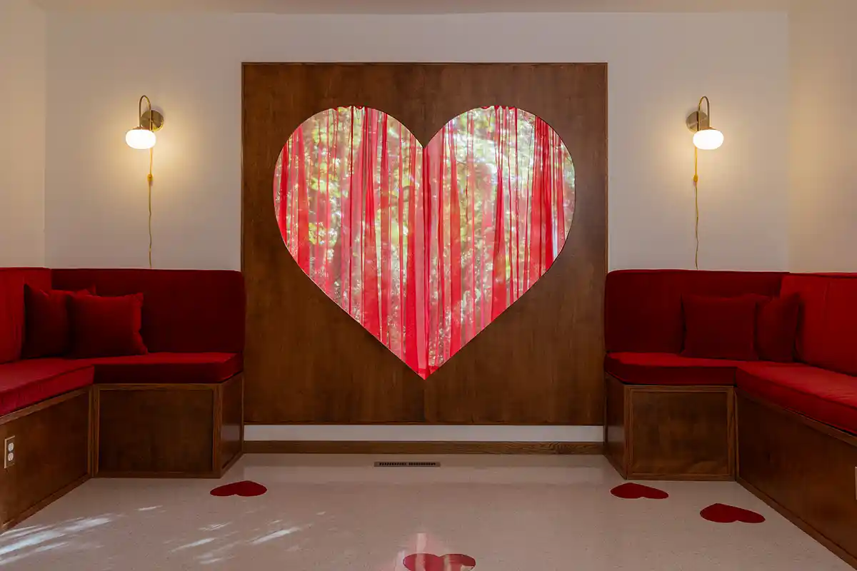 Heart shaped window in kitchen dining area at the Sweetheart Hideaway