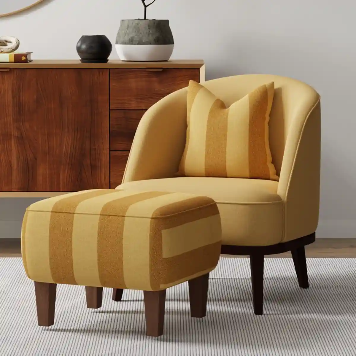 tone on tone yellow chair upholstered in a solid yellow and bold stripe