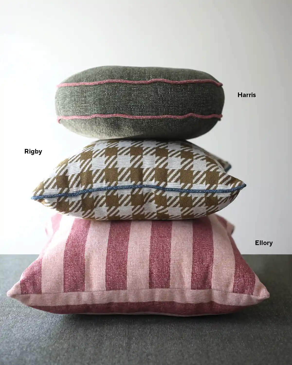 stack of pillows upholstered in new performance fabric patterns available at United Fabrics. Made in the USA