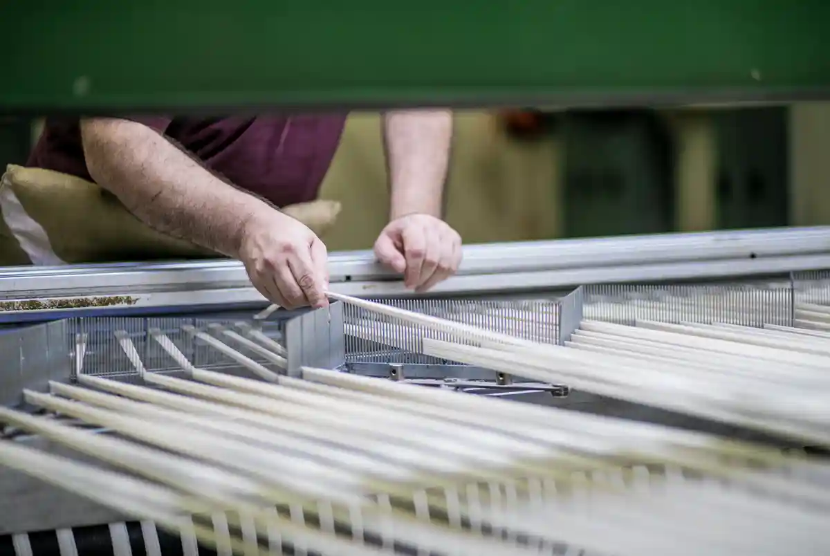 loom in a textile factory making upholstery fabric