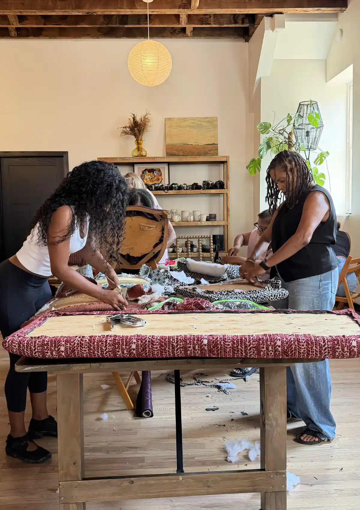 Students working on their upholstery projects