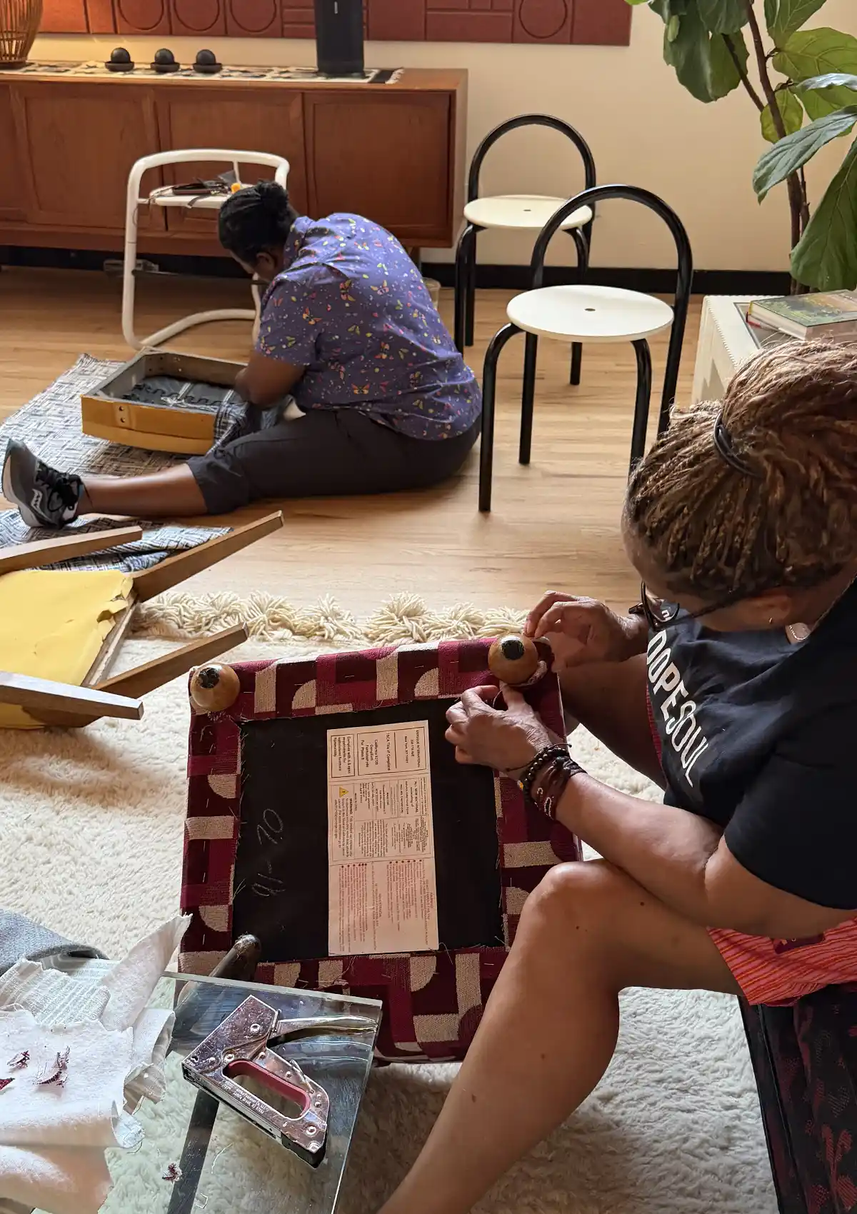 Students working on their upholstery projects